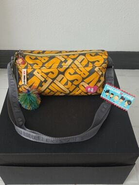 Harajuku Lovers Yellow Graphic Crossbody Bag with Gray Straps Pom Pom Charm.